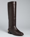 These riding boots are emboldened with golden trim, ready for stepping out stylishly 24/7; from Cynthia Vincent.
