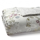 This romantic Waterford duvet boasts a multicolor floral pattern in cool shades of plum, green, slate blue and soft yellow on a silver ground. Resplendent details such as a silver twist cord and luminous silver sprig pattern reverse bring heirloom elegance to your bedroom.