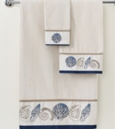 Life's a beach! Charm your bathroom in a look of seaside-inspired beauty with this Hampton Shells bath towel, featuring eclectic seashells in tan and blue tones for a calming appeal. Sheared velour face; terry reverse.