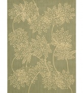 Enhance your living area with the beautiful look and sheen of Nourison's Capri rug. Woven of a blend of fine wool with Nourison's signature light-reflecting Luxcelle(tm) fibers, the luminous rug features a delicate leafy design across a soft sage background.