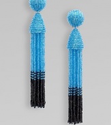 A bright fully beaded design with a dual-color tassel. Glass beads Drop, about 5 Clip-on back Imported 