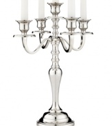 It's all about ambiance. Handcrafted in polished nickel plate, the Hampton candelabra from Leeber brings good old-fashioned grandeur to light.