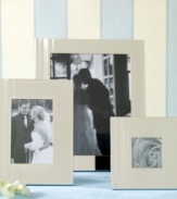 Charming and understated, kate spade silver-plated Library Stripe frames are etched with clean vertical stripes of varying widths that work equally well in salon or boudoir.
