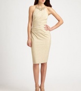 Chic and ultra-glamorous, this body-skimming metallic style features flattering side ruching and a bejeweled neckline.Jeweled halter style necklineSpaghetti strapsSide ruchingConcealed back zipFully linedAbout 26 from natural waist74% polyester/12% spandex/8% nylon/6% metallic threadDry cleanMade in USA of imported fabricModel shown is 5'9 (175cm) wearing US size 4. 
