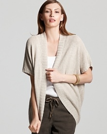 The relaxed, open styling of this Eileen Fisher linen cardigan lends itself to layering, topping your closet favorites with luxe lightweight warmth. The relaxed, open styling of this Eileen Fisher linen cardigan lends itself to layering, topping your closet favorites with luxe lightweight warmth.