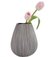 Vertical lines, muted colors and a quirky shape in simple ceramic give the Design Ideas Pinch vase a sense of understated cool.