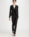This classic, menswear-inspired design is rendered in a sharp, pinstriped wool blend.Peaked lapels with buttonhole detailButton frontWelt pocketsButton cuffsAbout 23 from shoulder to hem56% wool/41% viscose/3% elastaneDry cleanMade in Italy of imported fabricModel shown is 5'11 (180cm) wearing US size 4. 