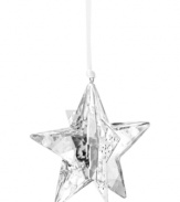 Star bright. The Christmas Moonlight Star ornament brings new brilliance to modern holidays, combining the gleam of Swarovski crystal with goldtone metal and sparkling chatons.