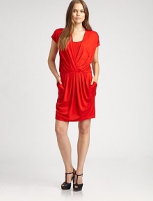 Pretty pleats adorn the front of this v-neck jersey dress offering a flattering fit.V-neckCap sleevesElasticized waistPleated frontPull-on styleAbout 22 from natural waist93% lyocell/7% elastaneDry cleanImported Model shown is 5'10 (177cm) wearing US size Small. Pretty pleats adorn the front of this v-neck jersey dress offering a flattering fit.V-neckCap sleevesElasticized waistPleated frontPull-on styleAbout 22 from natural waist93% lyocell/7% elastaneDry cleanImported Model shown is 5'10 (177cm) wearing US size Small.
