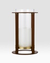 Crafted from gleaming glass, and encased in a supple saddle leather frame to evoke a heritage panache.12 L x 19 H6 X 9 candle recommendedLeather, glass and brassImported