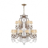 Glamour radiates from this medium-sized Ralph Lauren chandelabra, featuring eighteen bulbs topped with petite silk shades and draped with dazzling crystals.