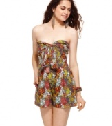 Rock carefree, beach-betty style in this romper from American Rag: the perfect union of colorful print and sweet details!
