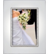 Sparkling rhinestones set in polished silver plate will make the Lenox Devotion picture frame a glamorous home for your most cherished photos. Qualifies for Rebate