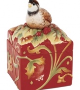 The ultimate gift box, this Bountiful Holiday keeper from Fitz and Floyd is rich with detail, from the sculpted autumnal pattern to its figural bird and berry lid. A gift in itself or an elegant way to present something smaller.