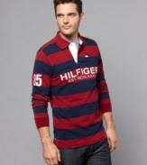 Secure your sporty style. Bold stripes make this Tommy Hilfiger rugby shirt a winning look.