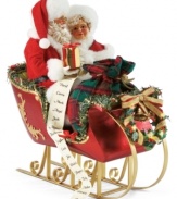 He's making a list and checking it twice! This festive figurine captures the age-old tradition of sitting on Santa's lap and telling him what gifts you want for Christmas.