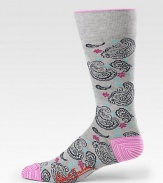 Elegant, finely woven dress socks with a paisley pattern and bright color at the toe and heel. Mid-calf height 80% cotton/19% nylon/1% Lycra Machine wash Imported 