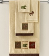 The great outdoors. Taking inspiration from classic lodge motifs, the Eldorado hand towel gives your space a rustic atmosphere with applique bears, moose and deer all in a rich, woodsy color scheme.