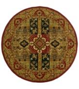 St. Croix's lush Ashton rug draws the eye with energy and charisma. Olive and burgundy tones mingle in the mosaic-like pattern, creating a richly detailed portrait. This stunning rug is at home in most settings and is able to unify the most eclectic room. Hand-tufted of fine wool with cotton backing. (Clearance)