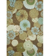 Mod-inspired blooms and pinwheel shapes twirl across the Promenade rug from Liora Manne, imparting vivacious character. Sky blues, hazelnuts and soft greens enhance any space. UV-stabilized polypropylene/acrylic blend offers the look of natural fibers but resists fading and wear, making the rug perfect for patios, kitchens or any indoor/outdoor area in need of a style boost.