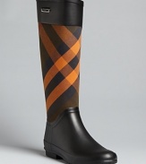 Checkmates: these classically Burberry rain boots give plaid added punch in a cheerful shade of orange.