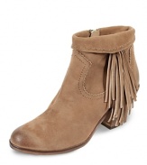 Fun fringe takes these closet essentials to new levels of flirtatious femininity. Pair these leather booties with a ladylike dress for head-turning contrast.