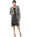 This sophisticated suit from Le Suit features a bold print on an open-front coat and a luxe shantung sheath. Sure to make an impression at your next event!