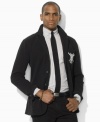 A modern reflection of casual polish, this classic three-button blazer is rendered in soft brushed mesh, making it a lightweight alternative for smart layering.