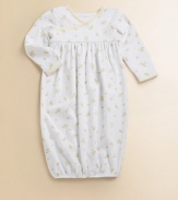 An adorable long-sleeved gown is rendered in soft, cotton jersey with a sweet duck print.Cross-wrap necklineLong sleevesPullover styleGathered empire waistElastic bottom bandCottonMachine washImported