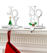 Send a message with the Joy and Noel stocking holders from Holiday Lane. Polished silvertone metal with colorful enamel accents will be a source of cheer from one Christmas to the next.