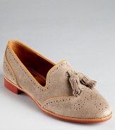 Adopt an ivy league look with DV Dolce Vita's bookish Millie loafers--these academia-bound slip-ons get trend right with wingtip perforation and tassel details.