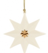 In true Lenox style, this porcelain star ornament with carved details adds a beautiful touch to your tree. Finished with a gold star center and hanging thread.