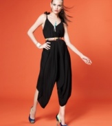 In an on-trend harem style, this Neon jumpsuit is a hot alternative to a dress for a party look!