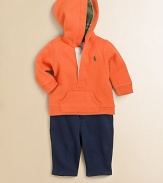 This coordinating athletic set includes a classic hooded fleece pullover and coordinating sweatpant for an authentic sporty look. Hoodie Attached hoodLong sleevesButton-frontKangaroo pocket Pants Elastic waistband with sewn drawstring bowFaux flyAngled pocketsCottonMachine washImported Please note: Number of buttons may vary depending on size ordered. 