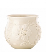 Already teeming with fresh blooms, the Floral Fields cachepot from Lenox has a serene, understated elegance in graceful ivory porcelain. A charming centerpiece! Qualifies for Rebate