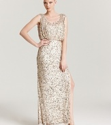 Floor-sweeping sequins make a sparkling impact on this Aidan Mattox gown, topped off with an elegant blouson bodice.