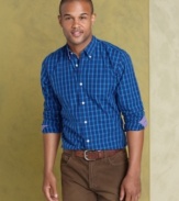 Button up your look with this casually perfect slim fit plaid shirt from Tommy Hilfiger.