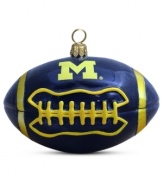 Team and Christmas spirit go hand in hand with the Michigan football ornament. Hand-painted glass is something students, alum and fans will cheer.