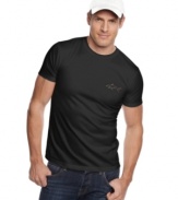 When it comes to golf apparel, casual style can still be classic. Make it easy with this t-shirt and golf hat set from Greg Norman for Tasso Elba. (Clearance)