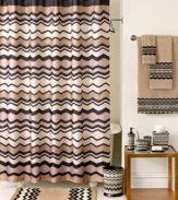 With a distinctly rustic ambiance, this Lauren bath rug from Avanti boasts a playful zigzag motif in warm tones of ivory, beige and black. Finished with a chenille woven base and skid-resistant latex backing.