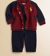 A soft, cozy three-piece set includes an athletic fleece jacket, a cotton jersey Henley bodysuit and comfortable, varsity-inspired sweatpants. Bodysuit CrewneckLong sleevesButton-frontBottom snaps Jacket CrewneckLong sleevesFront snapsAngled welt hand pockets Pants Elastic waistband60% cotton/40% polyesterMachine washImported Please note: Number of buttons may vary depending on size ordered. 