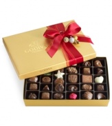 Donned with a red bow with elegantly placed baubles, this classic collection of Godiva chocolates makes a perfectly sweet and irresistible gift this season.