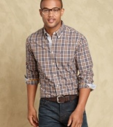 Make fall style happen with this plaid shirt from Tommy Hilfiger.