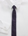 A simplistic design woven in smooth Italian silk.About 2 wideSilkDry cleanMade in Italy