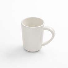 Michael Wainwright has returned to his sculptural roots with his Origin collection, a pure porcelain rendering of his most popular textured patterns. The Giotto design evokes the naturalistic quality of early Italian Renaissance paintings. These functional works of art are dishwasher and microwave safe, can go from freezer-to-oven, and can be used for baking or broiling.