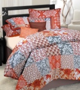 A vibrant palette of orange, red, grey and white illuminates your room in this Moroccan-inspired comforter set. Features a distinctive patchwork style pattern where squares display different floral designs. Two solid-colored decorative pillows tie together this look that's full of life.