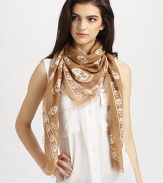 An allover skull print on a striking scarf in a blend of luxurious fibers. 90% modal/10% cashmereAbout 47 X 41Dry cleanMade in Italy