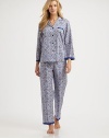 A vivid print with scrolling shapes revitalizes this classic two-piece set rendered in luxurious cotton sateen. Notch collarDropped shouldersLong sleevesButton frontFront patch pocketSolid trimElasticized waistbandInseam, about 29CottonMachine washImported