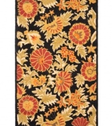 Attractive wildflowers create a sprawling, carefree design upon luxurious, long wool fibers. Woven meticulously in India, the Blossoms area rug from Safavieh presents these florals in bright hues with the modern home in mind.