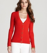A fiery rush of hue, this Tory Burch cardigan ignites your daily dress code. Garnish with gold accents for standout style.